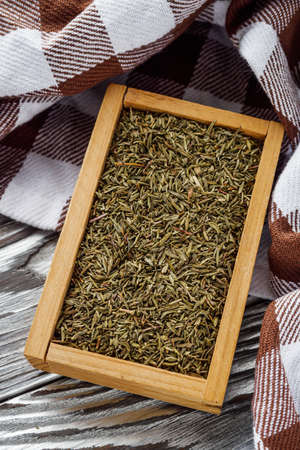 fragrant dried thyme on a wooden rustic background.の写真素材