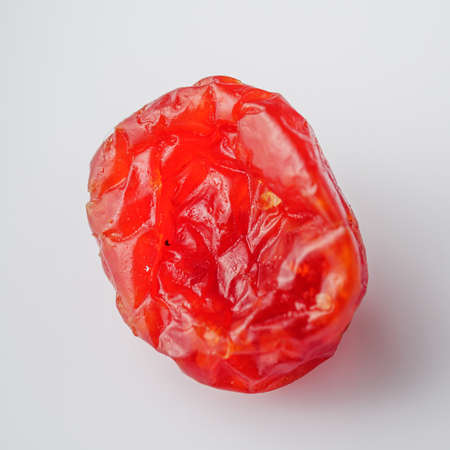 dried dogwood berry on a white acrylic background.の写真素材