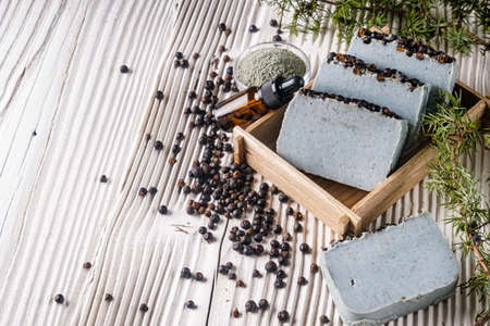 handmade soap on a white wooden rustic background.の写真素材
