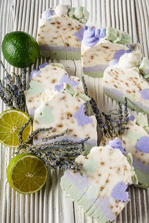 handmade soap on a white wooden rustic background.の写真素材