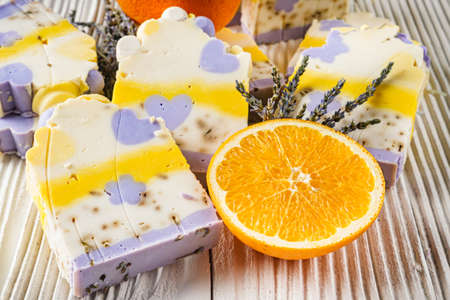 handmade soap on a white wooden rustic background.の写真素材