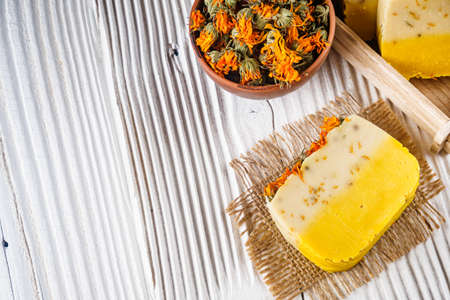 handmade soap on a white wooden rustic background.の写真素材