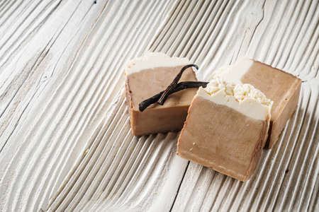 handmade soap on a white wooden rustic background.の写真素材