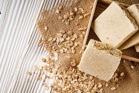 handmade soap on a white wooden rustic background.の写真素材