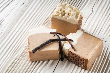 handmade soap on a white wooden rustic background.の写真素材