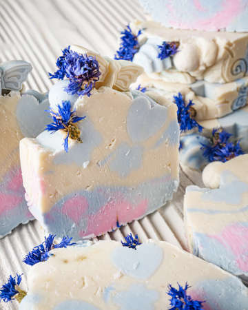 handmade soap on a white wooden rustic background.の写真素材