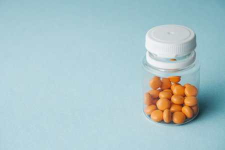 various medicines on a blue paper background.の写真素材