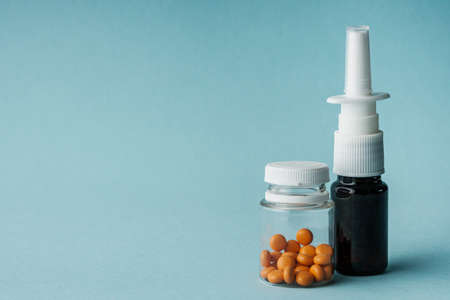 various medicines on a blue paper background.の写真素材