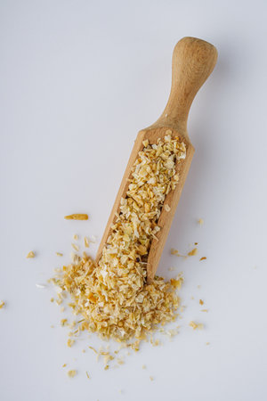 dried onions on a white acrylic background.の写真素材