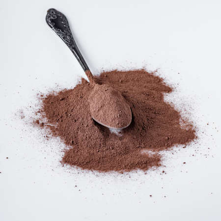 chocolate cocoa milk powder on a white background.の写真素材