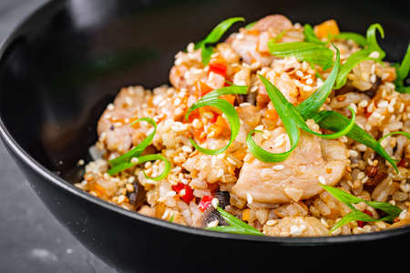 traditional Chinese fried rice on black background.の写真素材