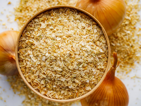 dried onions on a white acrylic background.の写真素材