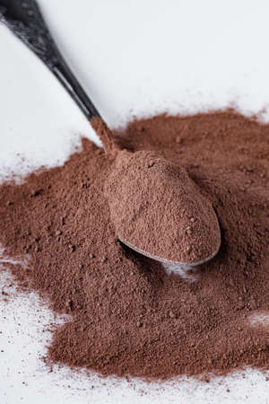 chocolate cocoa milk powder on a white background.
