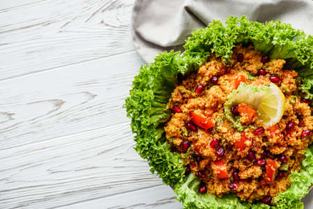 traditional turkish salad kisir on white background.の写真素材