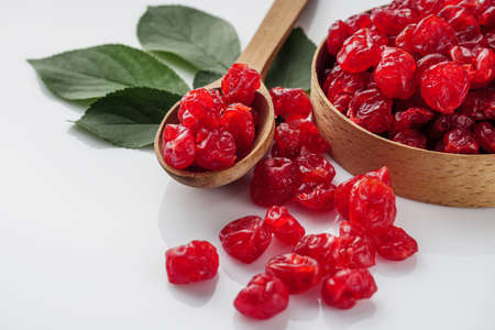 dried cherry on a white acrylic background.の写真素材