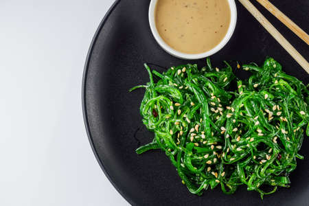 fresh delicious chukka wakame salad on a white background.の写真素材