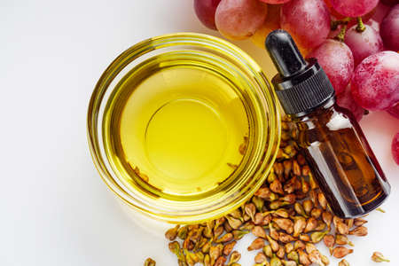 grapeseed essential oil on a white background.