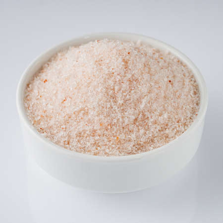 pink Himalayan salt on a white background.の写真素材