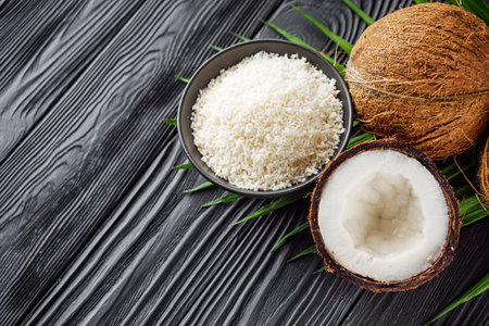 fresh natural coconut and shavings flakes on white acrylic backgroundの写真素材