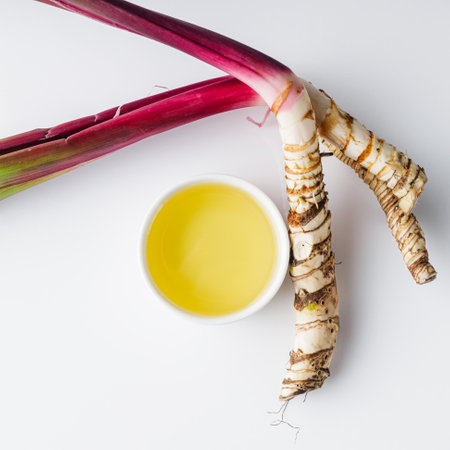 fresh yarrow root on a white acrylic background.