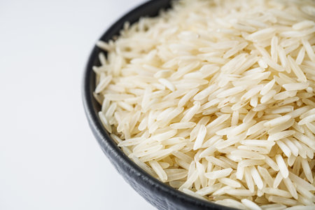 raw basmati rice on a white acrylic background.の写真素材