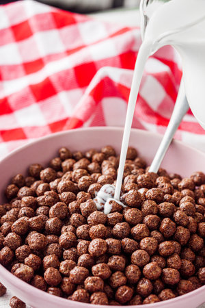 sweet crunchy chocolate children's breakfast chocolate balls on a white background.の写真素材