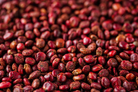 dry aromatic sumac spice on a white background.