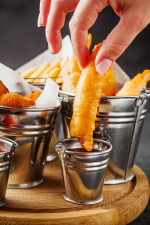 delicious hot snacks of fries, shrimp and nuggetsの写真素材