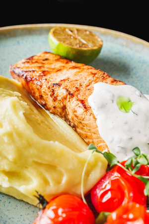 delicious grilled salmon steak with cream sauce.の写真素材