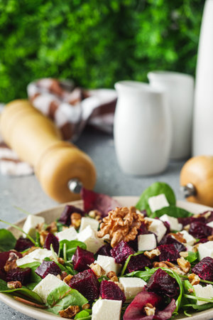 delicious fresh beet salad on a light stone background.の写真素材