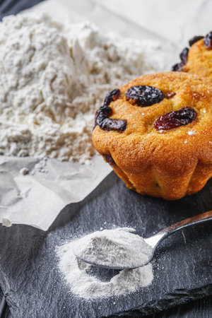 muffins baked with baking powder on a black wooden rustic background.の写真素材
