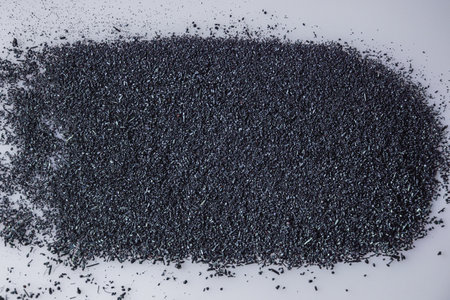 potassium permanganate crystals on a white background.の写真素材