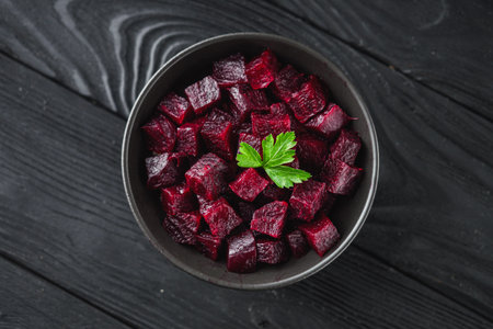 delicious fresh beet salad on dark wooden rustic background.