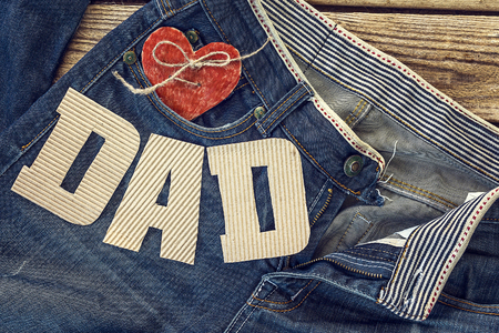 Fathers day background with cardboard letters against the backdrop of jeans.Happy fathers day concept.の写真素材