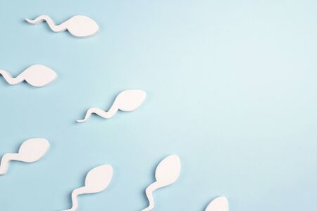 Sperm cells with copy space on a blue background.の写真素材