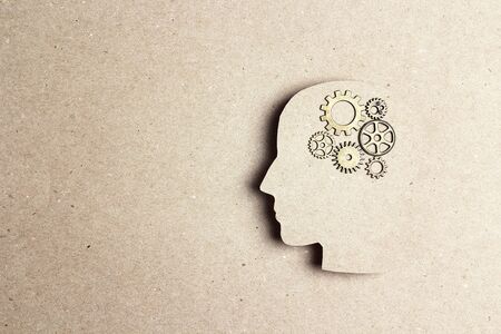 Silhouette human head with gears wheels. Strategic thinking and planning concept.