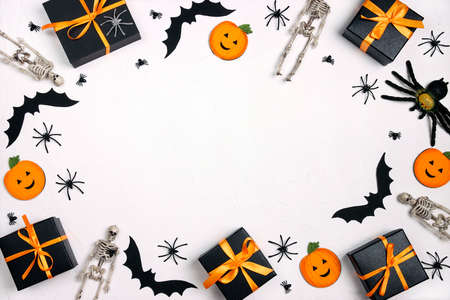 Frame from Halloween holiday decorations and gifts on white background. Copy space for text.の写真素材