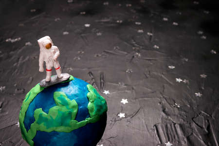 Astronaut in outer space over the planet Earth. Cosmonautics, science, environmental protection concept.の写真素材