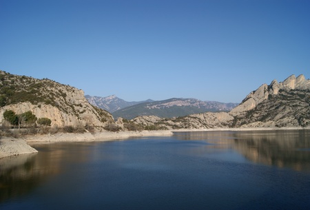 Oliana pond with beautiful calm waterの写真素材