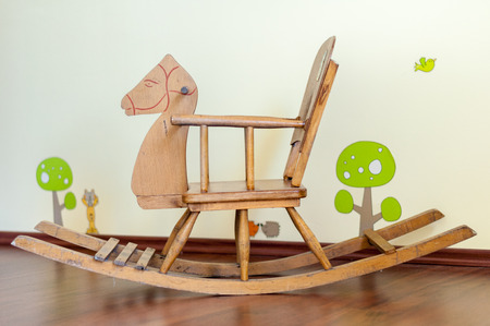 Wooden horse  in a child's bedroomの写真素材