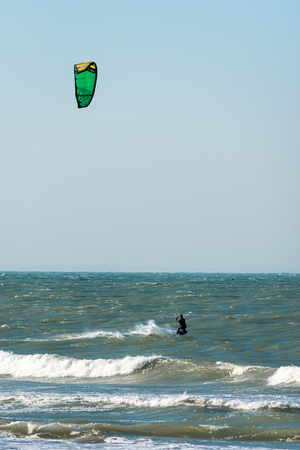 Kite surfer rides among the waves of Northsea, Franceのeditorial素材