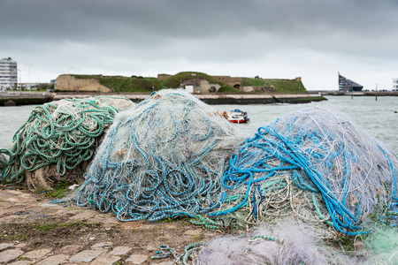 Fishing nets on dock portの写真素材