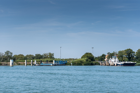 Barcarin ferry is a ferry that connects the two banks of the Grand Rhone in the Camargue. It is located in Salin-de-Giraud, provides access to the Regional Natural Park of Camargueの写真素材