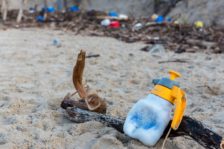 Rubbish and domestic waste polluting the beachの写真素材