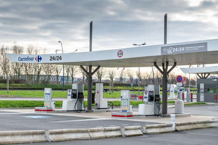 Calais, France - January 15, 2020 - Caddy stored in the parking of french international hypermarket...