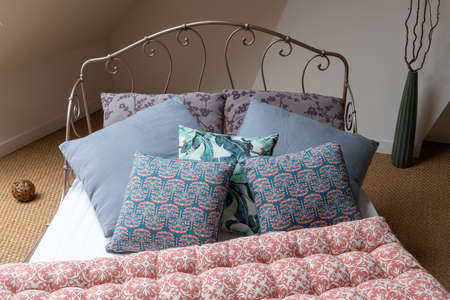 Concept decoration: Bedroom under the eaves with natural light and seagrass floor