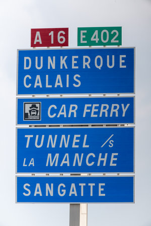 Coquelles, France - May 03, 2021: Direction sign indicating the Channel Tunnel near Calaisのeditorial素材