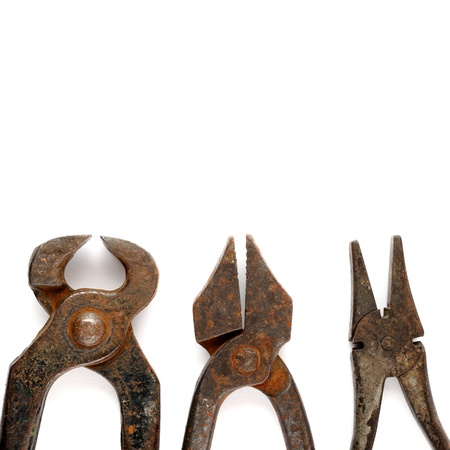 Old rusty tools isolated on white backgroundの写真素材