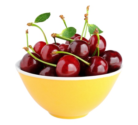 Cherry in bowl isolated on white backgroundの写真素材