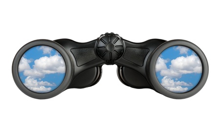 Binoculars with reflection of blue sky in lenses isolated on white background